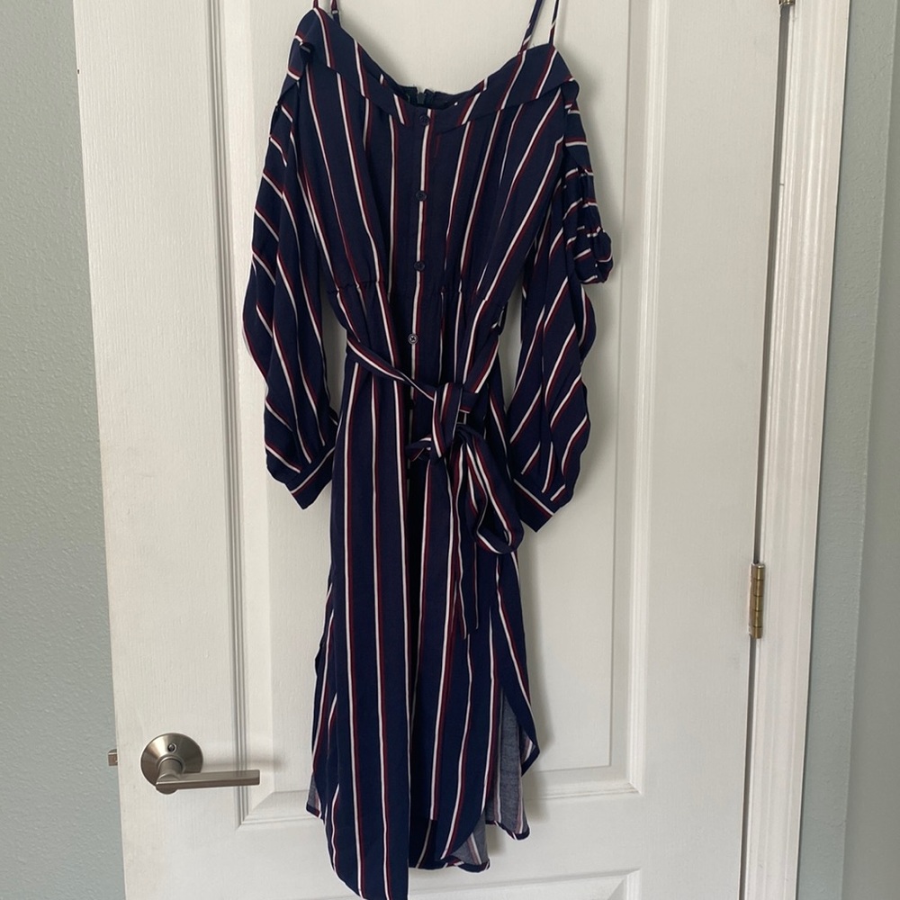 Off the shoulder midi dress with a cute sleeve detail Lightly paddded bra inside